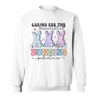 Caring For The Sweetest Bunnies Pediatric Easter Nurse Sweatshirt - Seseable