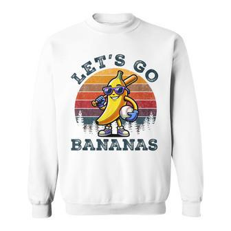 Lets Go Bananas Banana Playing Baseball Baseball Player Sweatshirt - Monsterry AU