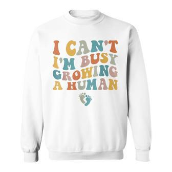 Groovy I Can't I'm Busy Growing A Human For Pregnant Women Sweatshirt - Thegiftio UK