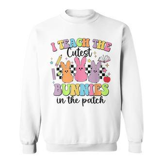 I Teach The Cutest Bunnies In The Patch Easter Teacher Sweatshirt - Monsterry AU