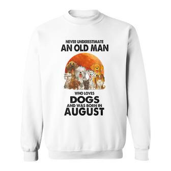 Never Underestimate An Old Man Who Loves Dogs Born In August Sweatshirt - Monsterry CA