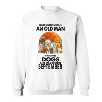Never Underestimate An Old Man Who Loves Dogs Born September Sweatshirt - Monsterry UK