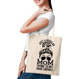 Just A Regular Mom Trying To Not Raise Liberals Black Graphic Tote Bag - Seseable