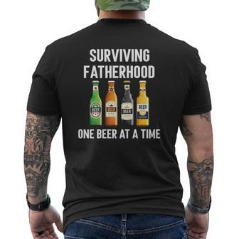 Mens Surviving Fatherhood One Beer At A Time Mens Back Print T-shirt | Mazezy