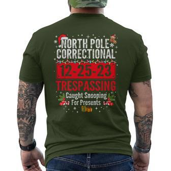 North Pole Correctional Christmas Snooping Presents Men's T-shirt Back Print | Mazezy