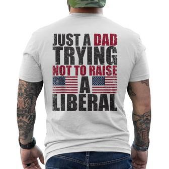 Just A Dad Trying Not To Raise A Liberal Men's T-shirt Back Print - Seseable