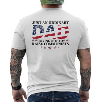 Just An Ordinary Dad Trying Not To Raise Communists Father's Mens Back Print T-shirt | Mazezy
