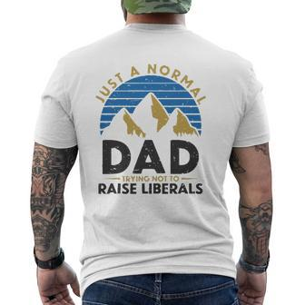 Mens Vintage Just A Normal Dad Trying Not To Raise Liberals Trump Mens Back Print T-shirt | Mazezy
