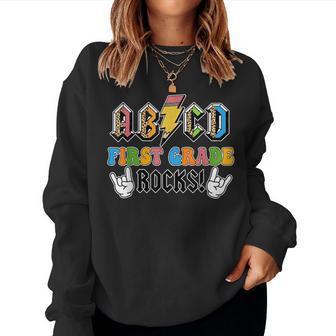 Abcd First Grade Rocks Back To School 1St Grade Teacher Women Sweatshirt | Mazezy DE