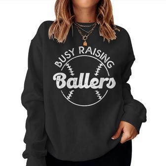 Baseball Dad Busy Raising Ballers Mom Of Baseball Players Women Sweatshirt - Monsterry UK
