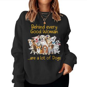 Behind Every Good Woman Are A Lot Of Dogs Dog Lovers Women Sweatshirt - Monsterry CA