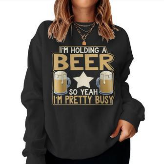 I'm Holding A Beer So Yeah I'm Pretty Busy Beer Lover Women Sweatshirt - Monsterry