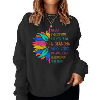 Sunflower Never Underestimate The Power Of Grandma Who Votes Women Sweatshirt - Seseable
