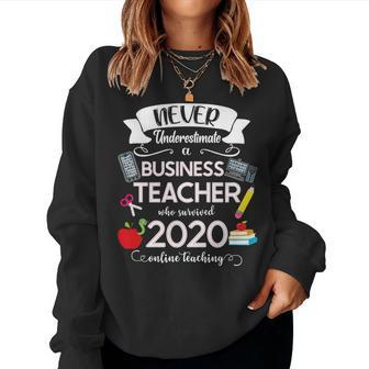 Never Underestimate A Business Teacher Who Survived 2020 Women Sweatshirt | Mazezy