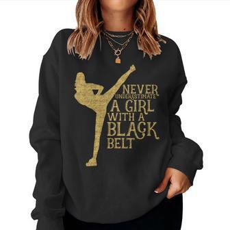 Never Underestimate A Girl With A Black Belt Women Sweatshirt - Thegiftio UK