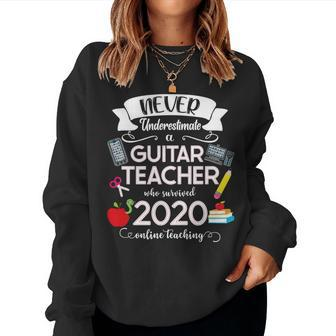 Never Underestimate A Guitar Teacher Who Survived 2020 Women Sweatshirt | Mazezy
