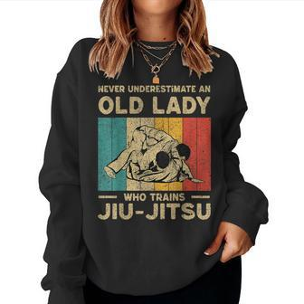 Never Underestimate An Old Lady Bjj Brazilian Jiu Jitsu Women Sweatshirt | Mazezy