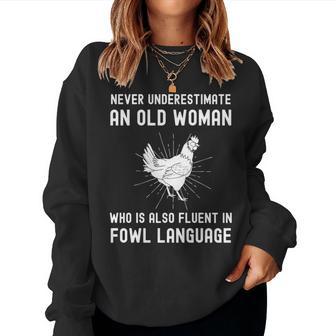 Never Underestimate An Old Woman Who Is Also Fuent In Fowl Women Sweatshirt | Seseable UK