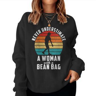 Never Underestimate A Woman With A Beanbag Women Sweatshirt | Mazezy