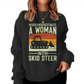 Never Underestimate A Woman With A Skid Sr Construction Women Sweatshirt - Thegiftio UK