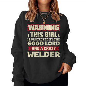 Warning This Girl Is Protected By Welder Girlfriend Wife Women Sweatshirt - Monsterry DE