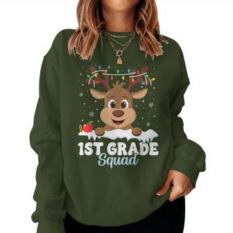 1St Grade Teacher Christmas First Grade Squad Reindeer Xmas Women Sweatshirt - Seseable