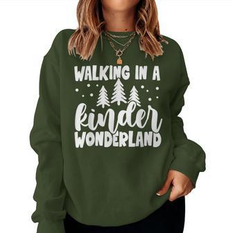 Christmas Kindergarten Teacher Walking In Kinder Wonderland Women Sweatshirt - Monsterry