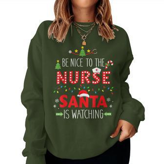 Be Nice Nurse Santa Watching For Xmas Rn Lpn Or Icu Women Sweatshirt - Thegiftio UK