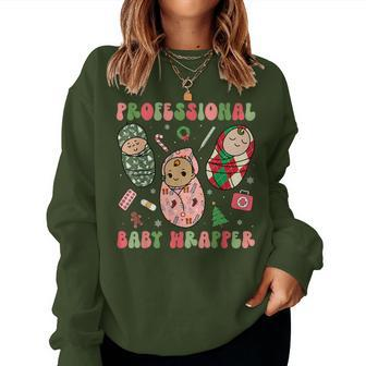 Professional Baby Wrapper Labor Delivery Nurse Christmas Pjs Women Sweatshirt - Monsterry