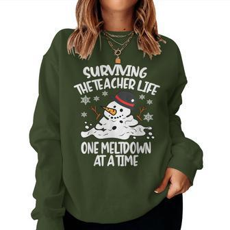 Surviving The Teacher Life One Meltdown At A Time Christmas Women Sweatshirt - Seseable