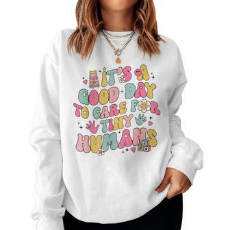 It's A Good Day To Care For Tiny Humans Retro Teacher Life Women Sweatshirt - Monsterry
