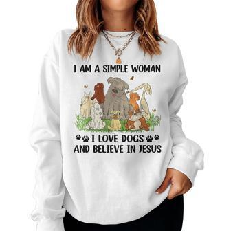 I Am A Simple Woman I Love Dogs And Believe In Jesus Women Sweatshirt - Seseable