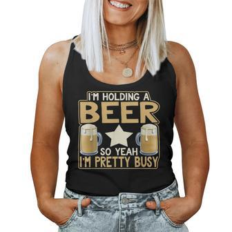 I'm Holding A Beer So Yeah I'm Pretty Busy Beer Lover Women Tank Top - Monsterry