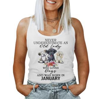Never Underestimate An Old Lady Who Loves Dogs-January Women Tank Top - Monsterry UK
