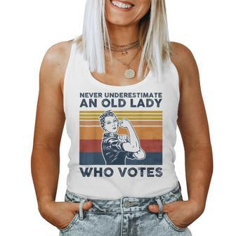 Never Underestimate An Old Lady Who Votes Feminist Women Tank Top - Monsterry