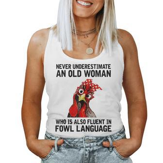 Never Underestimate An Old Woman Who Is Also Fluent Chickens Women Tank Top | Mazezy