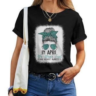 In April We Wear Teal Sexual Assault Awareness Messy Bun Women T-shirt - Monsterry