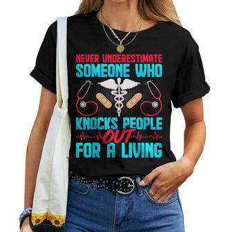 Crna Nurse Never Underestimate Someone Who Knocks People Women T-shirt | Mazezy