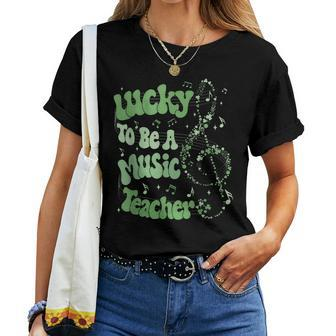 Retro Groovy Lucky To Be A Music Teacher St Patrick's Day Women T-shirt - Thegiftio