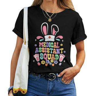 Retro Groovy Medical Assistant Squad Bunny Ear Flower Easter Women T-shirt | Mazezy AU