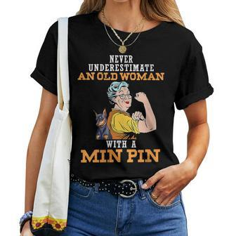 Never Underestimate An Old Woman With A Min Pin Women T-shirt - Thegiftio UK