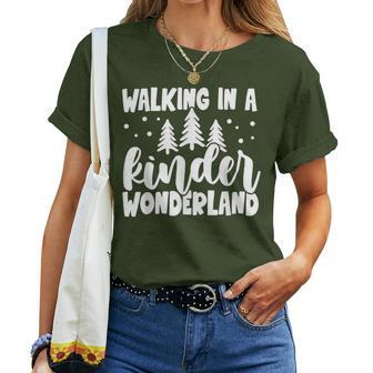 Christmas Kindergarten Teacher Walking In Kinder Wonderland Women T-shirt - Monsterry CA