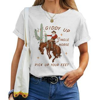 Giddy Up Jingle Horse Pick Up Your Feet Cowboy Santa Cactus Women T-shirt | Mazezy