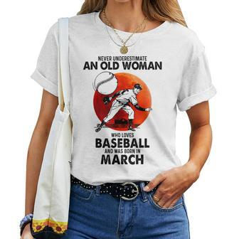Never Underestimate An Old Woman Love Baseball March Women T-shirt - Monsterry DE