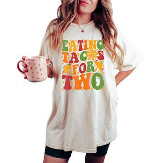 Groovy Pregnant Mom Pregnancy Eating Tacos For Two Women's Oversized Comfort T-shirt - Seseable