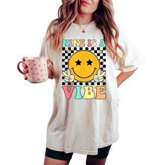 Nine Is A Vibe Groovy 9Th Birthday Party 9 Years Old Women's Oversized Comfort T-shirt | Mazezy