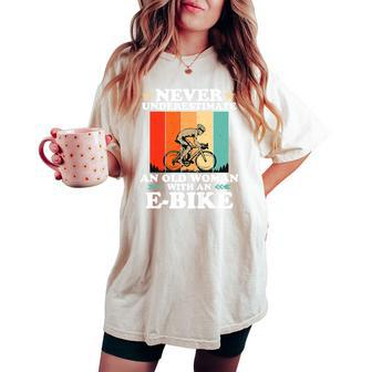 Never Underestimate An Old Woman With An E-Bike Bike Women's Oversized Comfort T-shirt - Monsterry AU