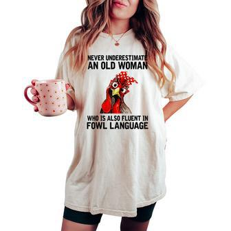Never Underestimate An Old Woman Who Is Also Fluent Chickens Women's Oversized Comfort T-shirt | Mazezy
