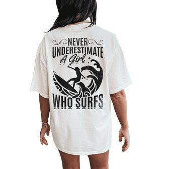 Big Wave Surfing Girls Never Underestimate A Girl Who Surfs Women's Oversized Comfort T-Shirt Back Print | Mazezy