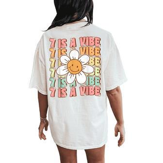 Seven Is A Vibe Cute Groovy 7Th Birthday Party Daisy Flower Women's Oversized Comfort T-Shirt Back Print - Seseable